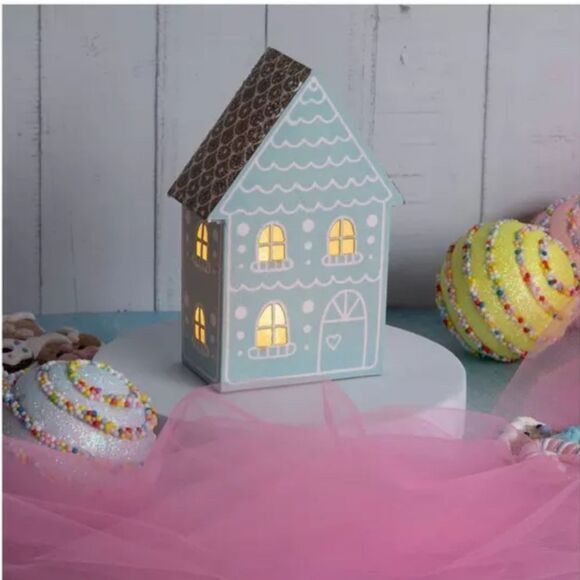 A set of 4 pinks,blue, green Light Up Gingerbread House - Picture 3 of 9